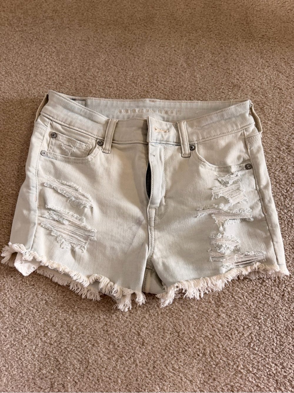 American Eagle Outfitters Cream Distressed Denim Shorts
